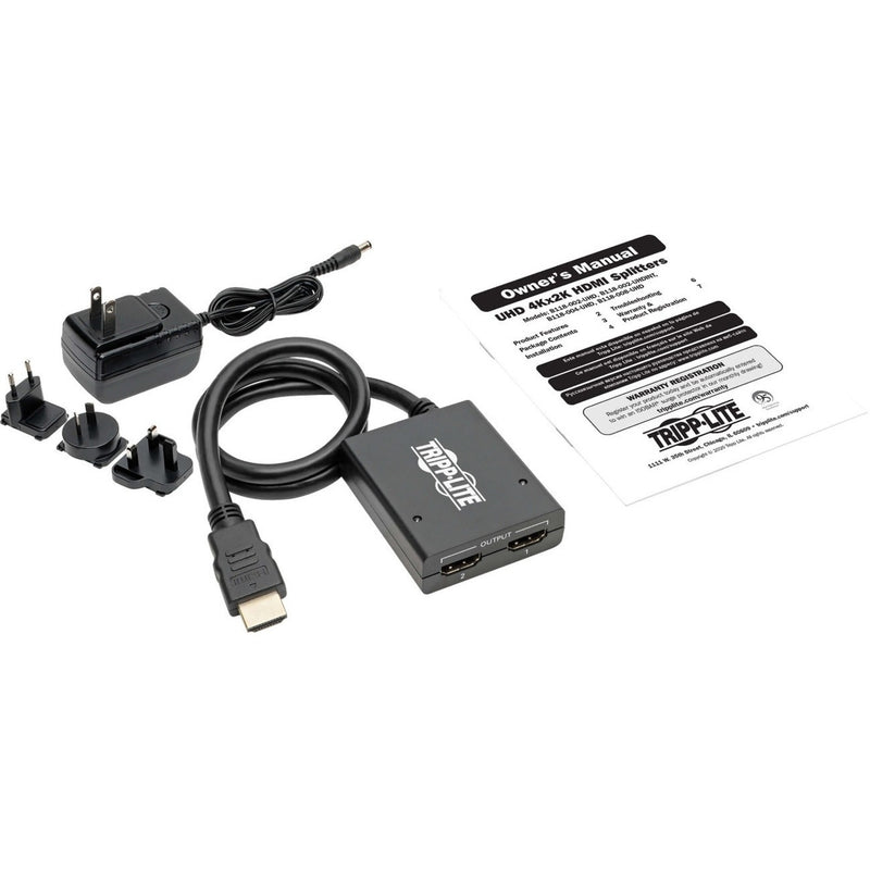 Complete HDMI splitter kit with power adapters and manual laid out on white background