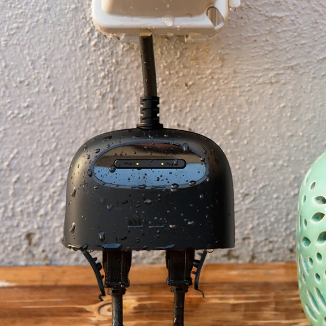 Close-up of water-resistant Kasa outdoor smart plug showing water droplets on surface-alternate-image3