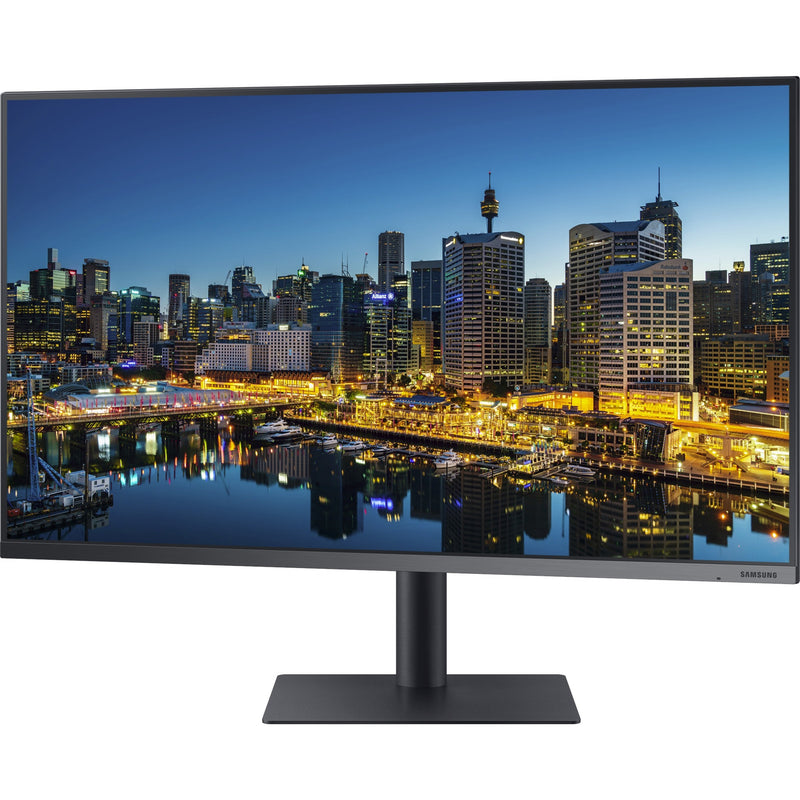 Samsung 32-inch 4K UHD monitor displaying vibrant cityscape with waterfront reflection at night