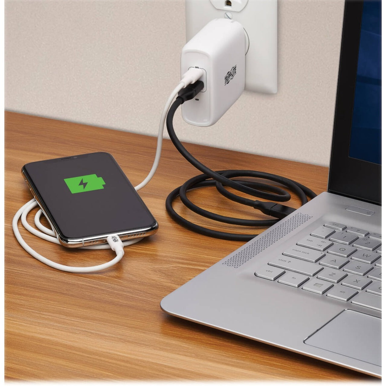 Tripp Lite charger in use powering a laptop and smartphone-alternate-image6