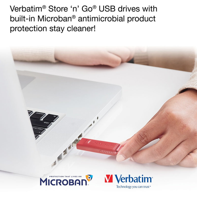 Hand inserting a red Verbatim USB drive into a laptop USB port