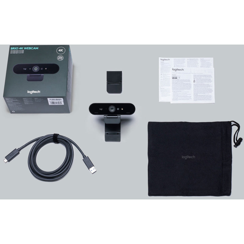 Complete package contents of Logitech 4K PRO WEBCAM including webcam, cables, and accessories