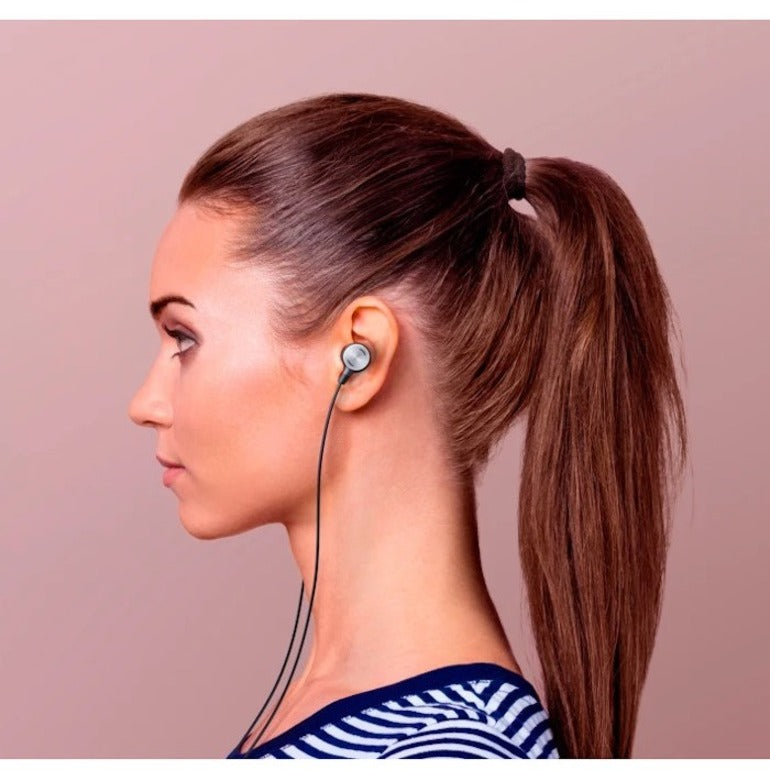 Profile view showing professional fit of Logitech Zone Wired Earbuds