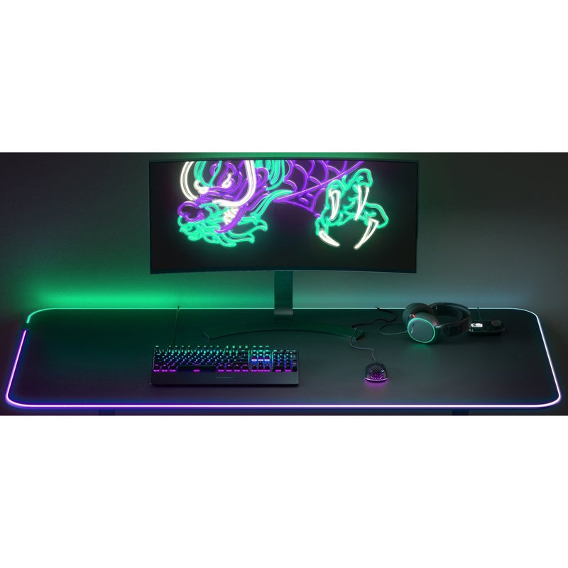 Gaming setup showing Aerox 3 with matching RGB peripherals