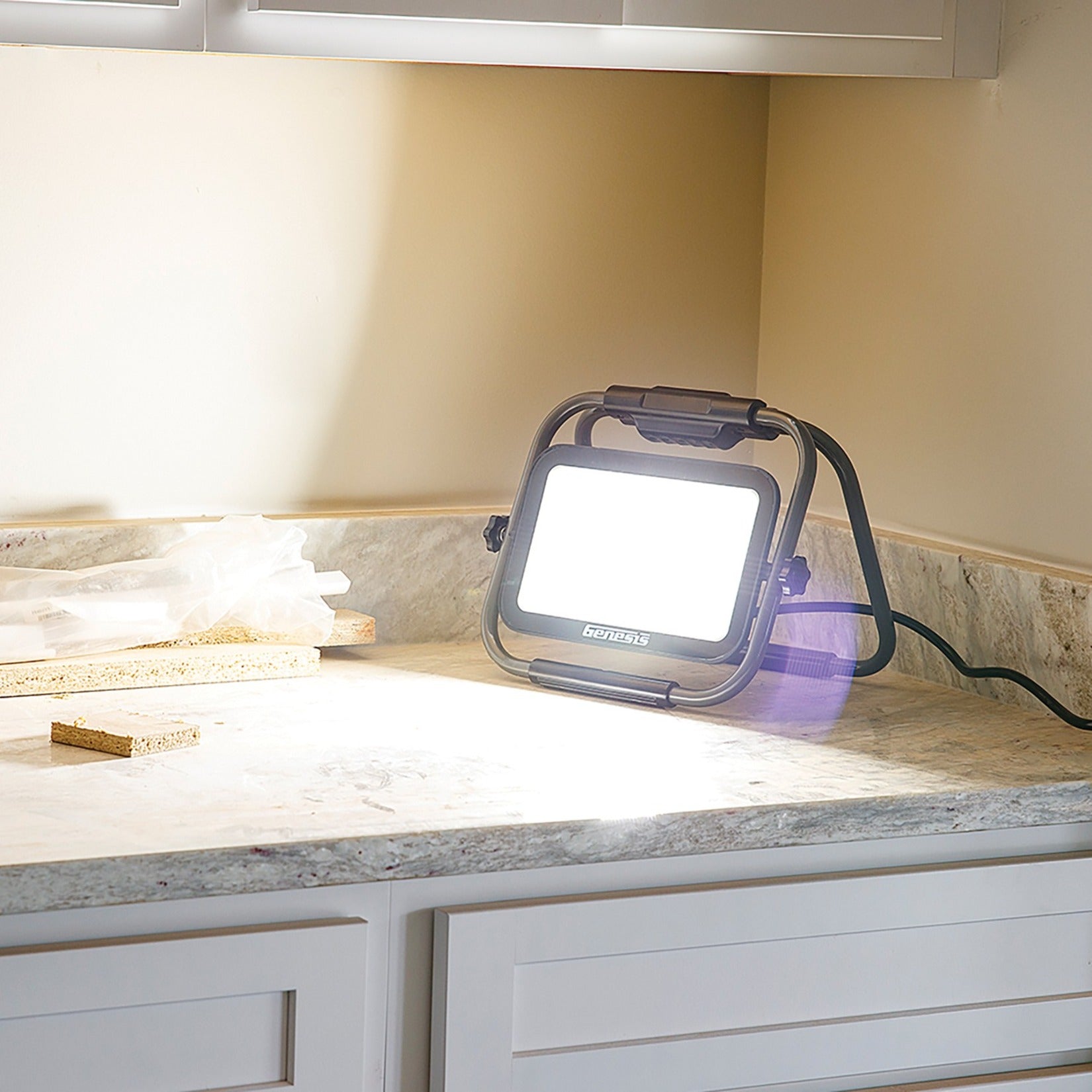 Genesis LED work light illuminating a workspace on a counter surface-alternate-image3