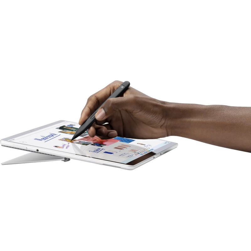 Person using Surface Slim Pen 2 on a Surface tablet with natural writing motion