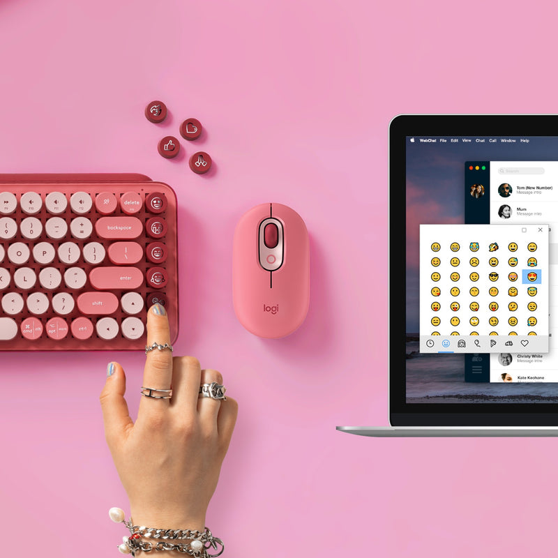 Lifestyle shot of POP Keys keyboard with customizable emoji keys, matching mouse, and laptop setup