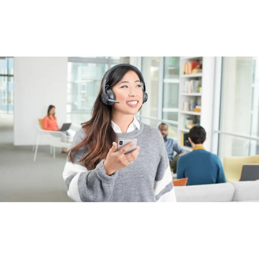 Professional using Logitech Zone Wireless Headset in modern office setting-alternate-image9