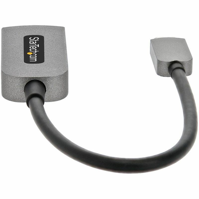 Curved view of StarTech.com adapter showing compact design and cable flexibility