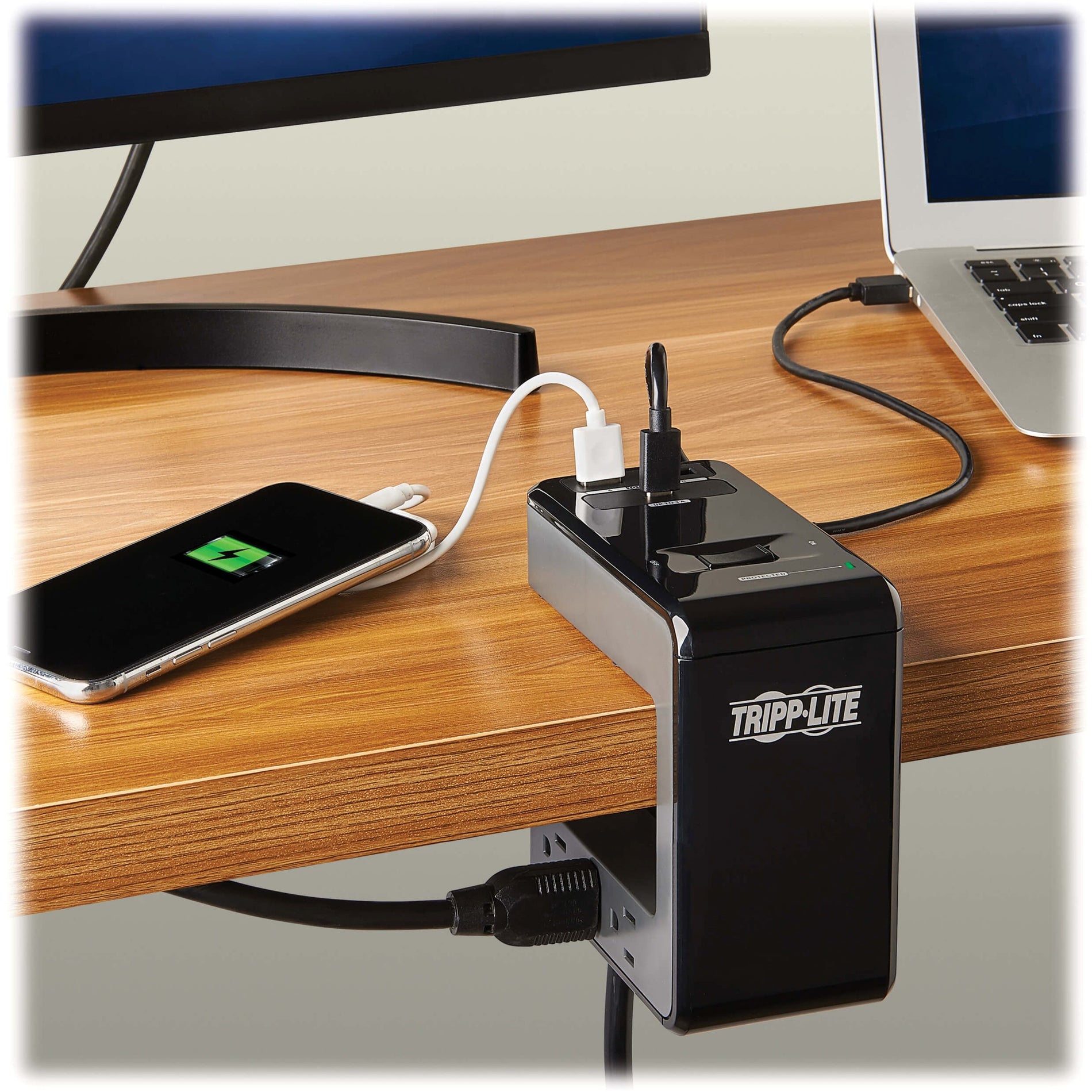 Tripp Lite surge protector in use on a wooden desk with connected devices-alternate-image10