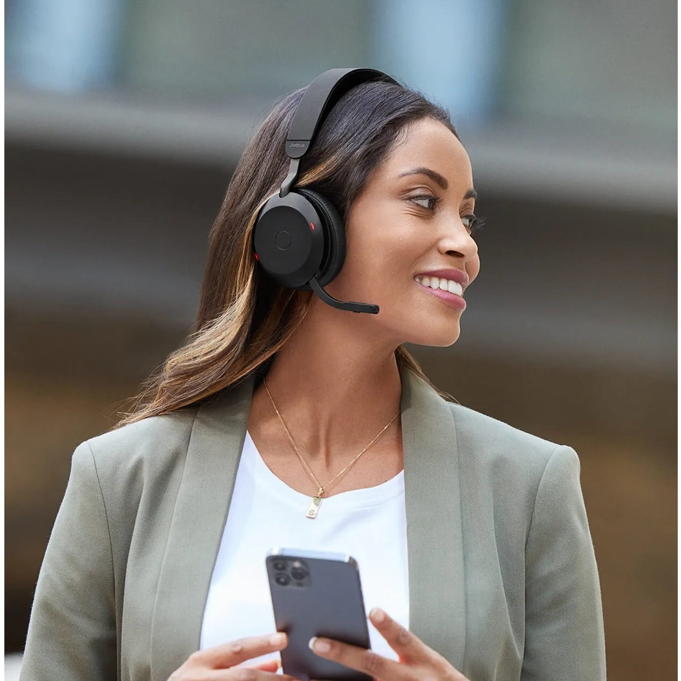 Professional using Jabra Evolve2 75 with smartphone-alternate-image9