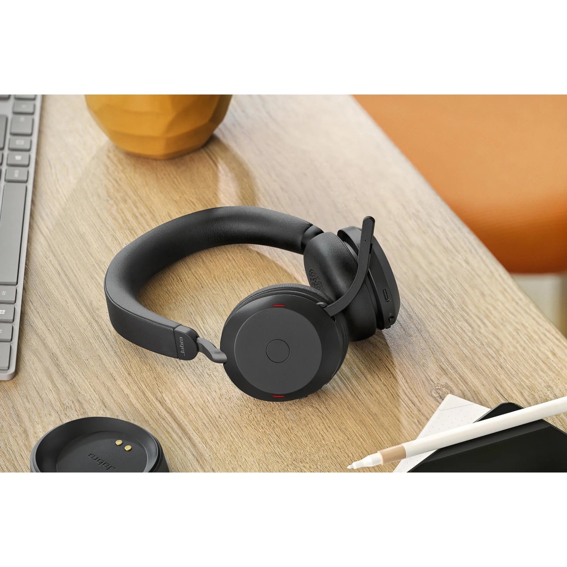 Jabra Evolve2 75 on wooden desk with laptop and office supplies-alternate-image6