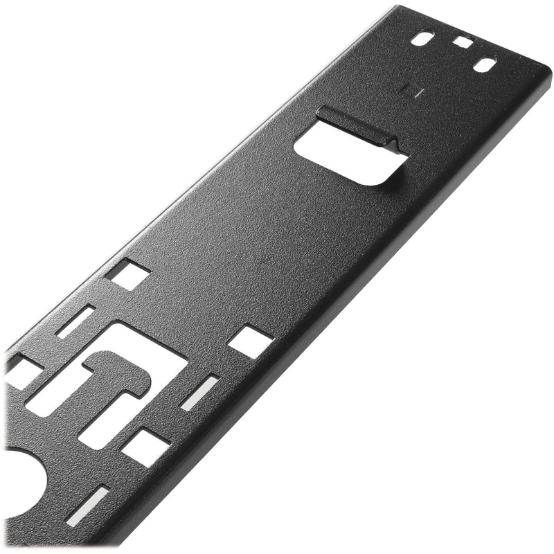 Detailed view of cable management bar surface finish and mounting cutouts