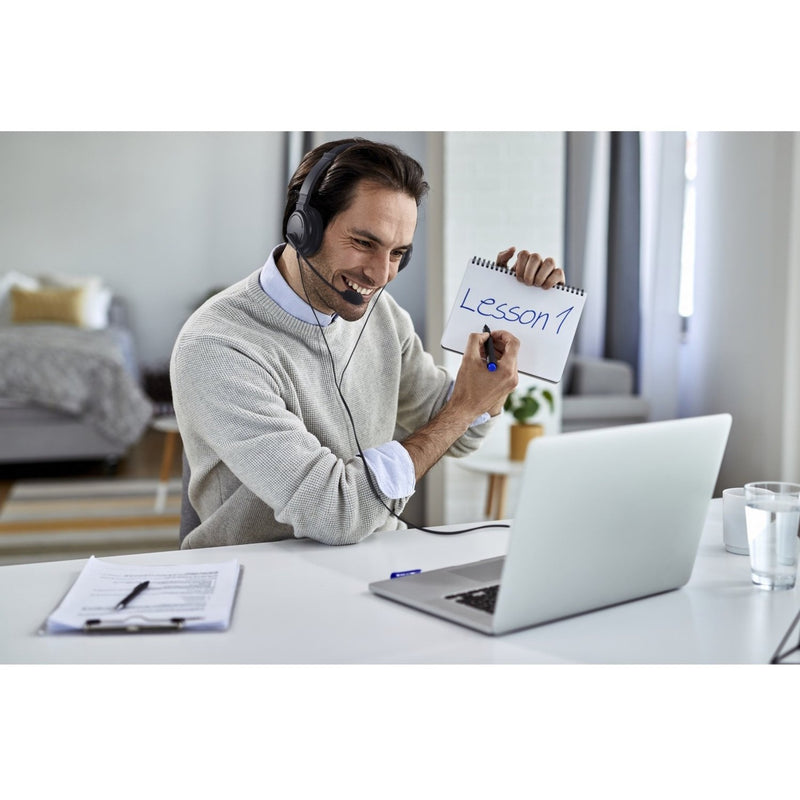 Teacher using Kensington headset for online instruction