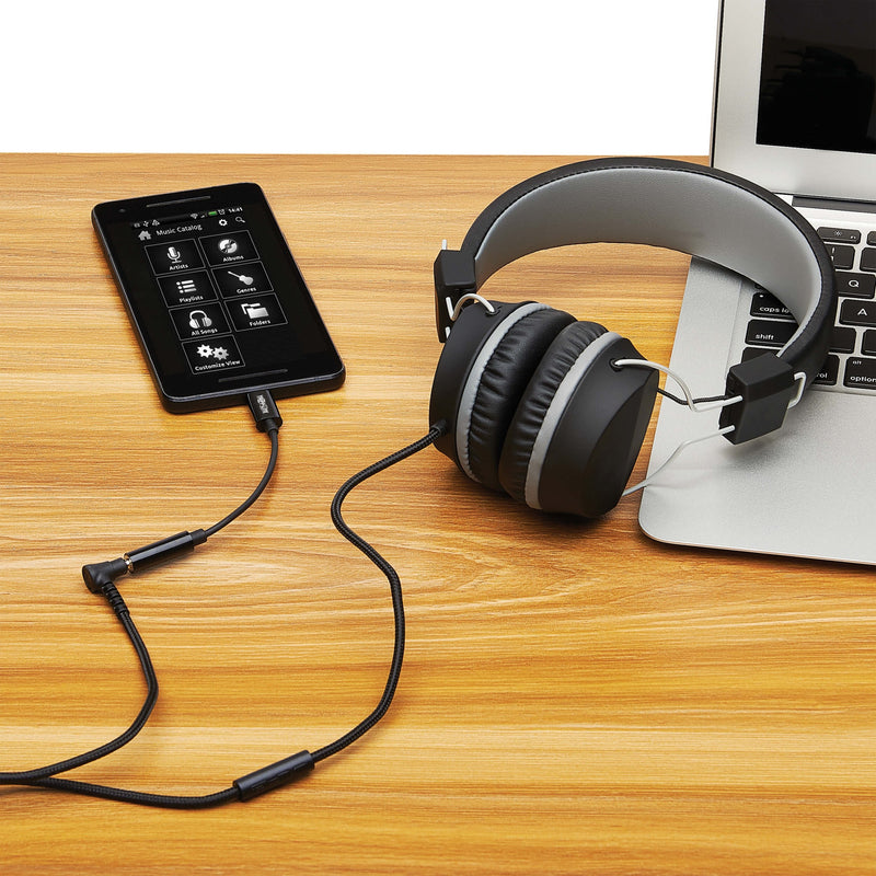 Lifestyle image showing adapter connecting headphones to laptop and smartphone