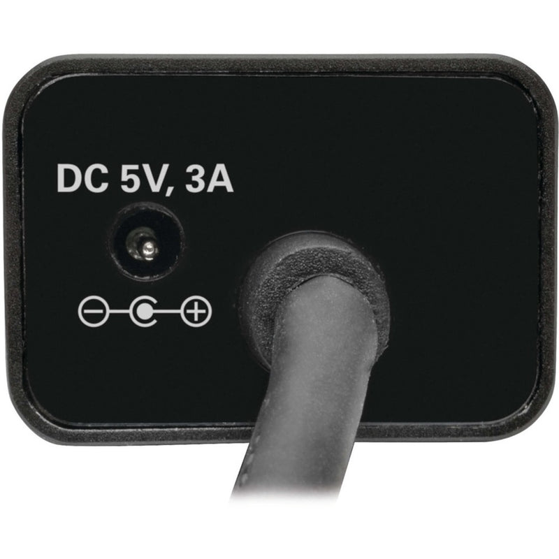 Close-up of DC 5V 3A power input port with polarity diagram