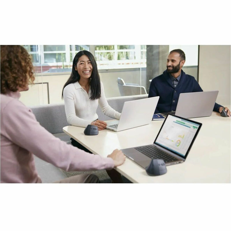 Logitech Lift Ergo Mouse being used in a collaborative office meeting