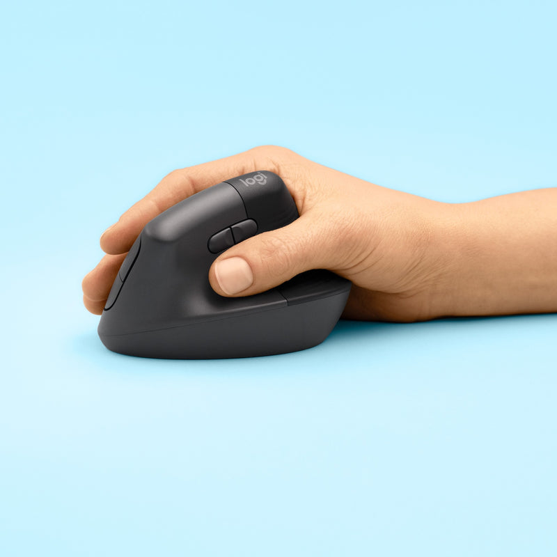 Hand demonstrating natural grip position on Logitech Lift Vertical Mouse against light blue background