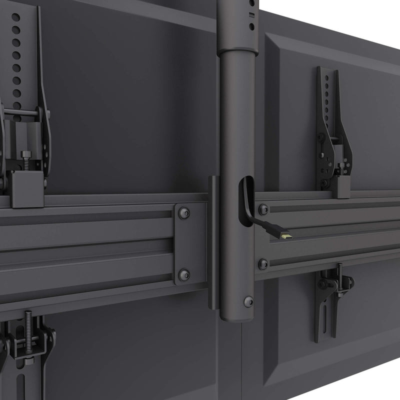 Detail view of the Kanto MBC411T's cable management features and mounting connections