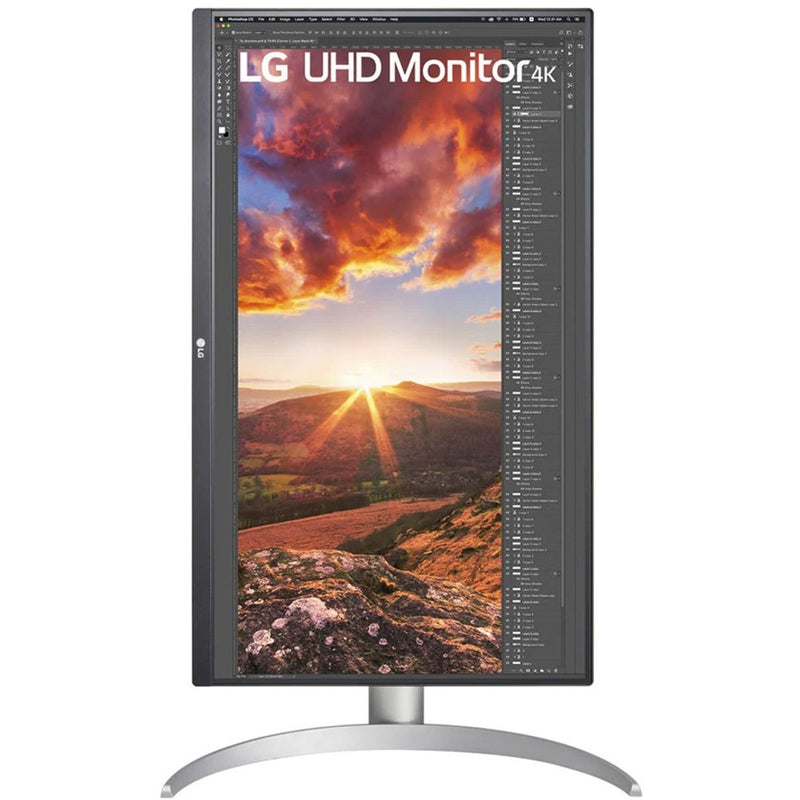 LG monitor displaying photo editing software with landscape image