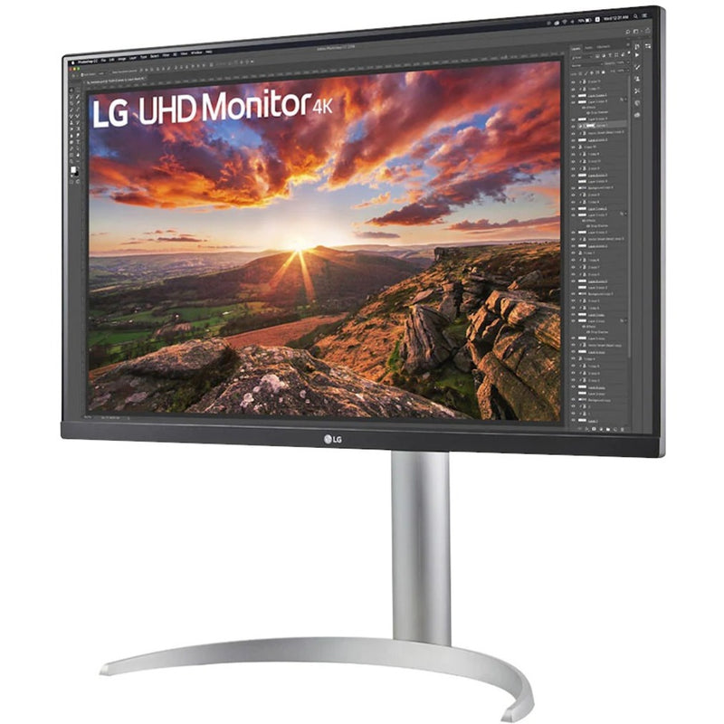 LG 27-inch monitor displaying a dramatic sunset landscape photo in Photoshop interface