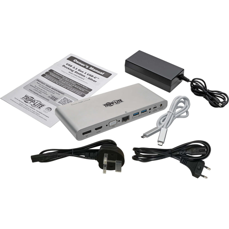 Package contents of Tripp Lite docking station including main unit, power adapter, cables and manual