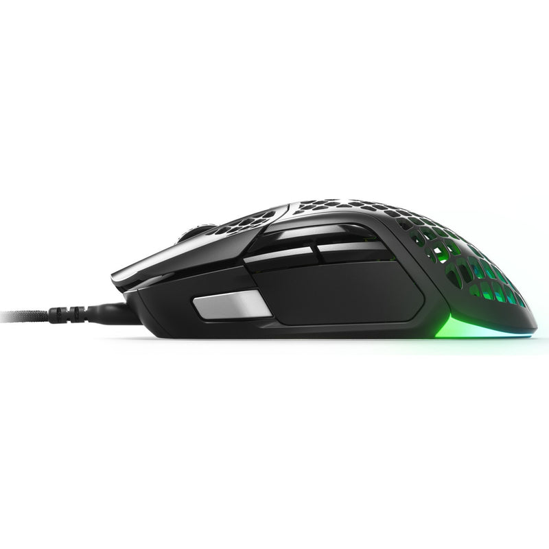 Side view of SteelSeries Aerox 5 gaming mouse showing honeycomb shell design with green RGB lighting