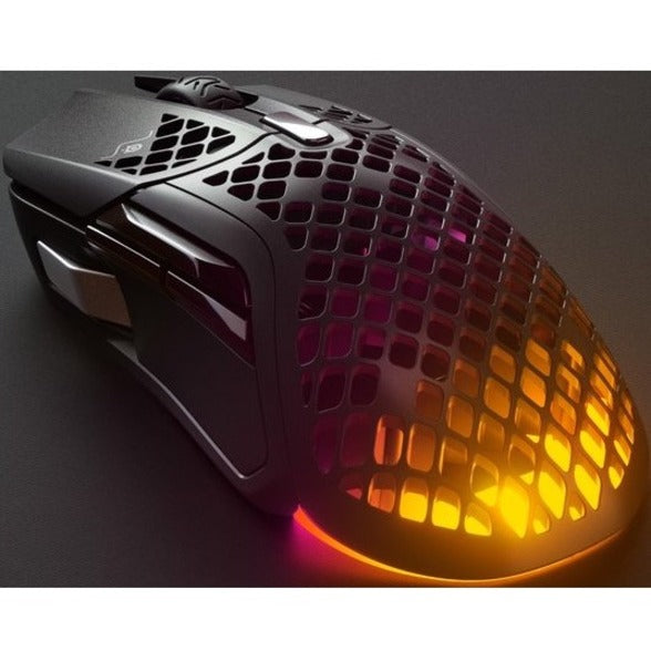 Close-up of Aerox 5 Wireless showing RGB light flow through honeycomb pattern