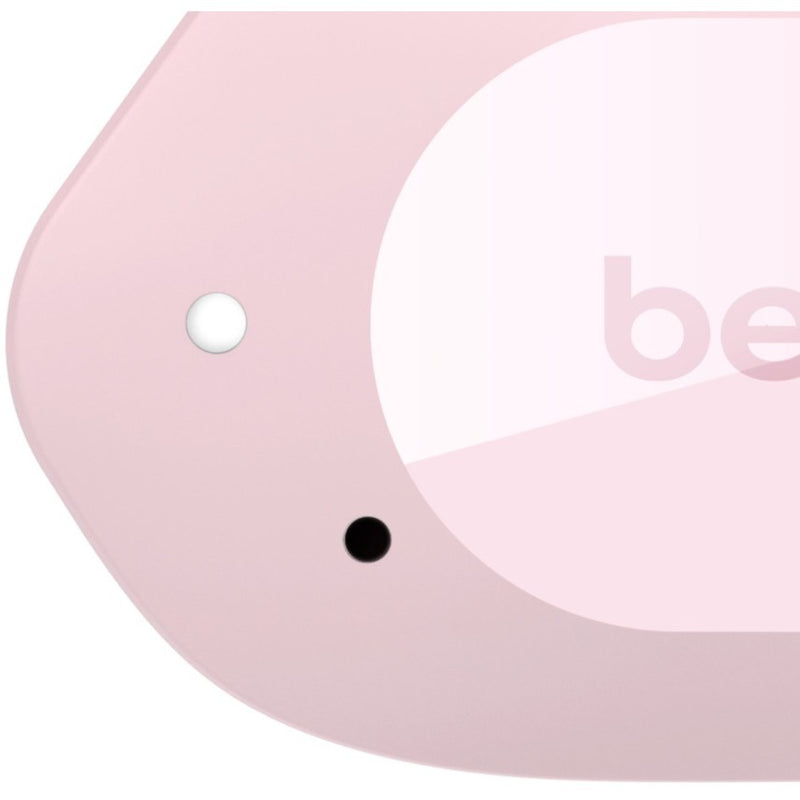 Close-up detail of Belkin SOUNDFORM Play earbud showing touch control surface and branding