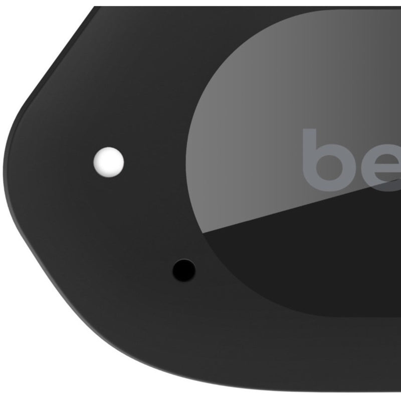 Detailed view of Belkin SOUNDFORM Play earbud touch control surface with LED indicator