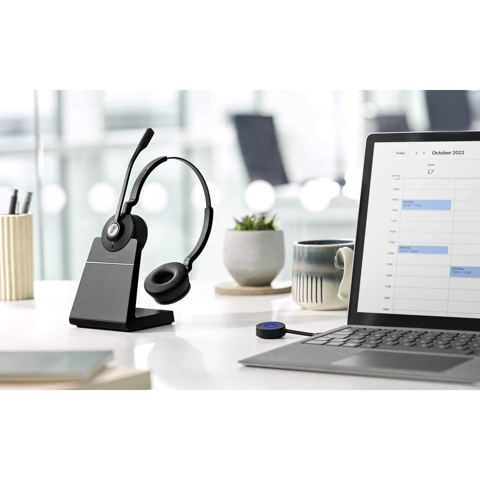 Jabra Engage 55 headset on desk with laptop and office accessories showing workspace integration-alternate-image4