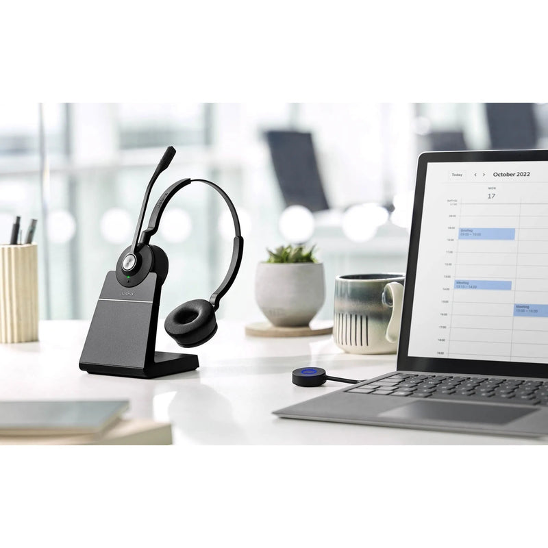 Jabra Engage 55 headset on desk with laptop and office accessories showing workspace integration