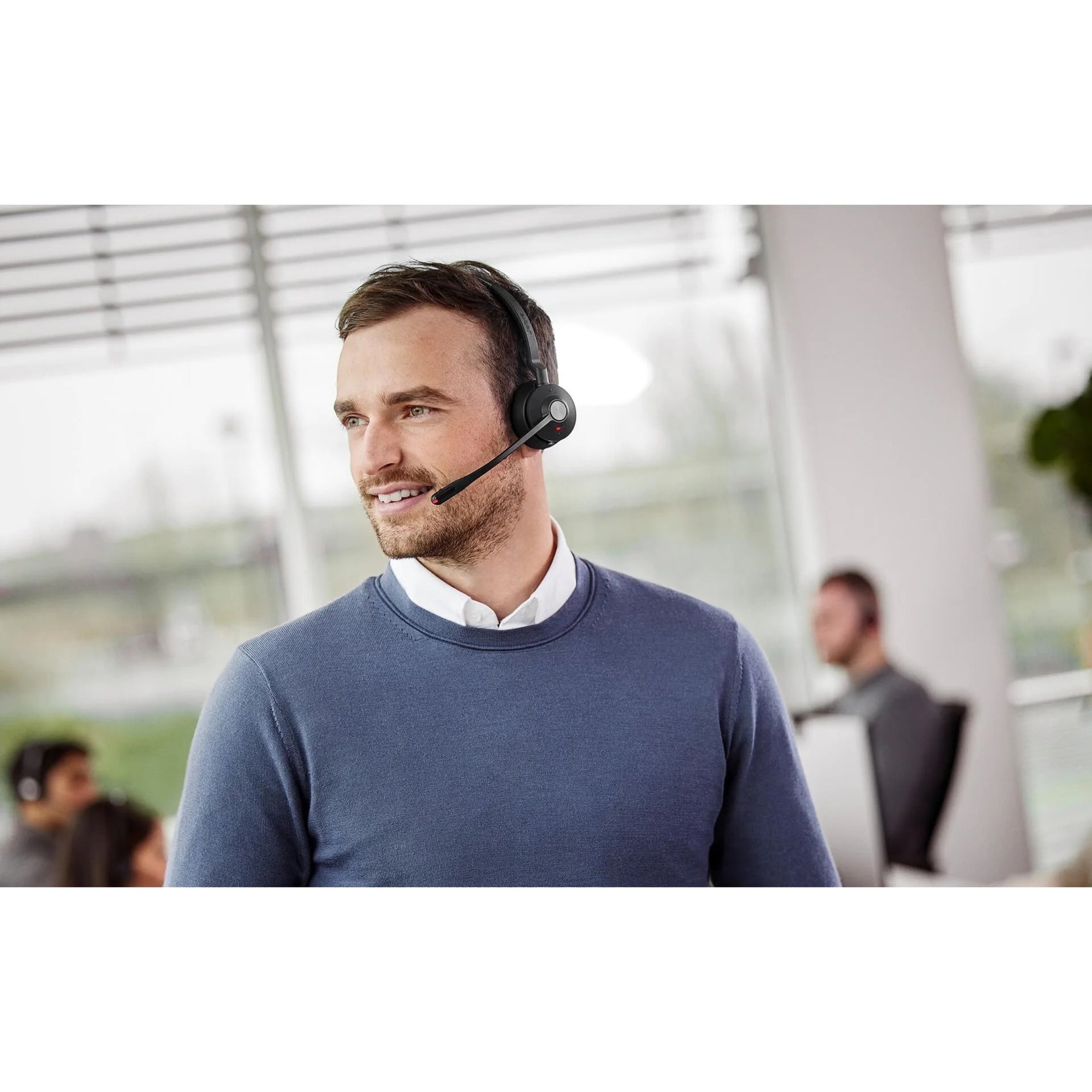 Professional wearing Jabra headset in office environment-alternate-image5