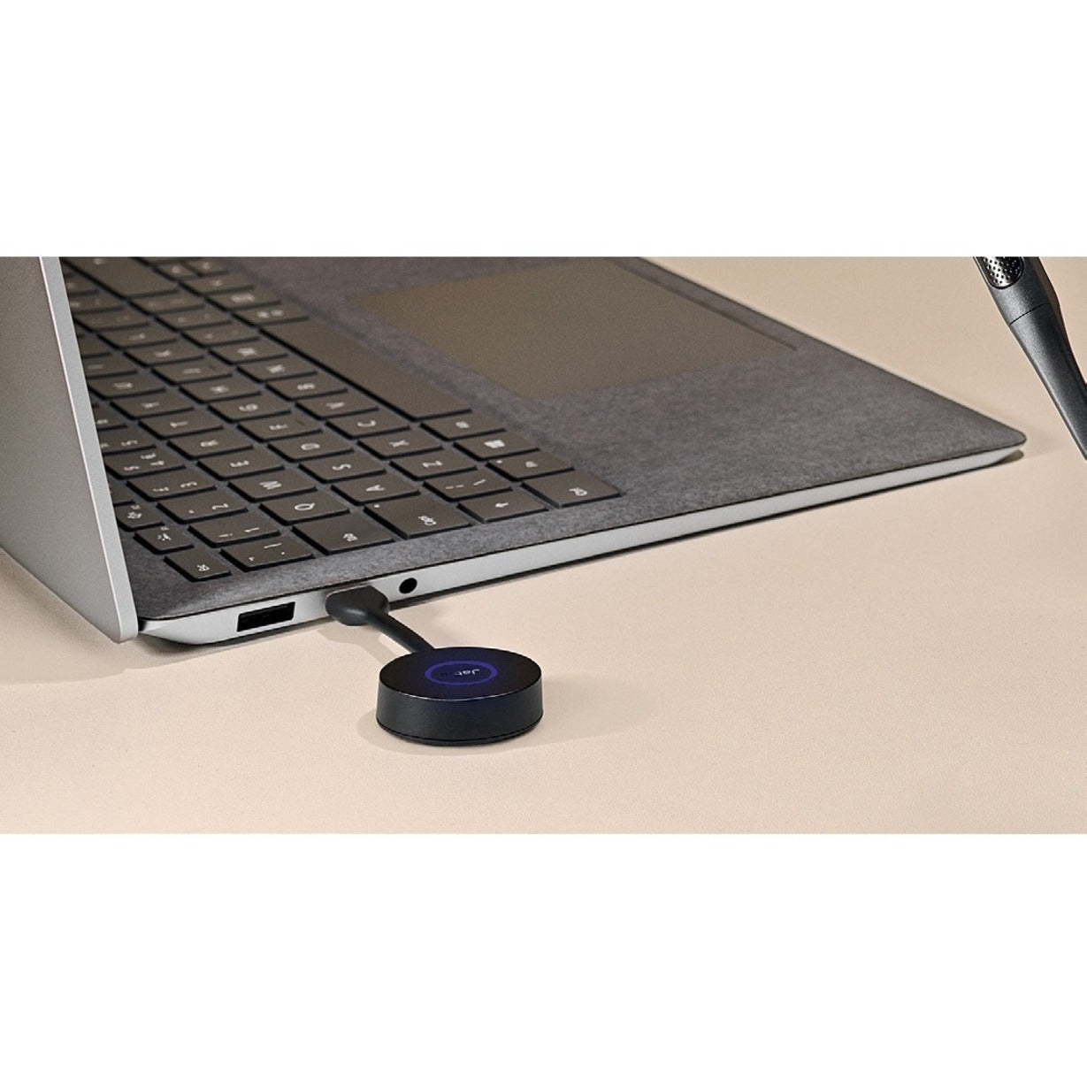 Jabra Engage 55 USB adapter connected to laptop showing workspace integration-alternate-image4