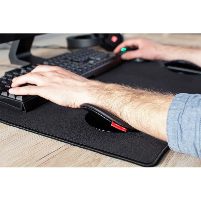 Close-up of Slidepad Ergo integration with mouse pad and desk surface