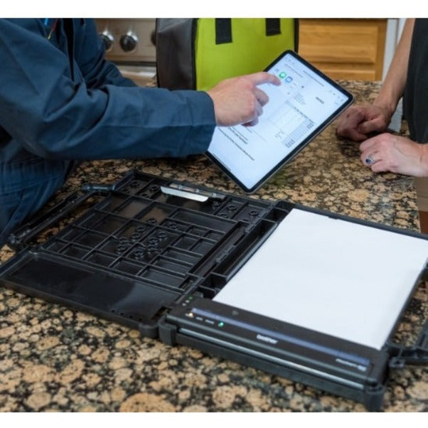 Brother PocketJet 8 being used with tablet device showing mobile printing capability-alternate-image5