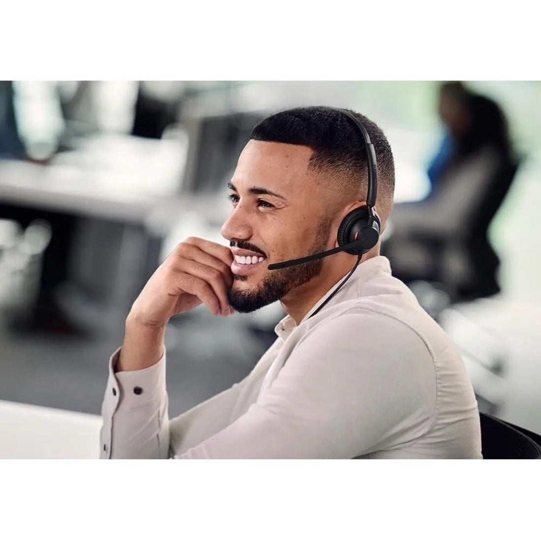 Contact center professional wearing Jabra Engage 40 headset while working-alternate-image6