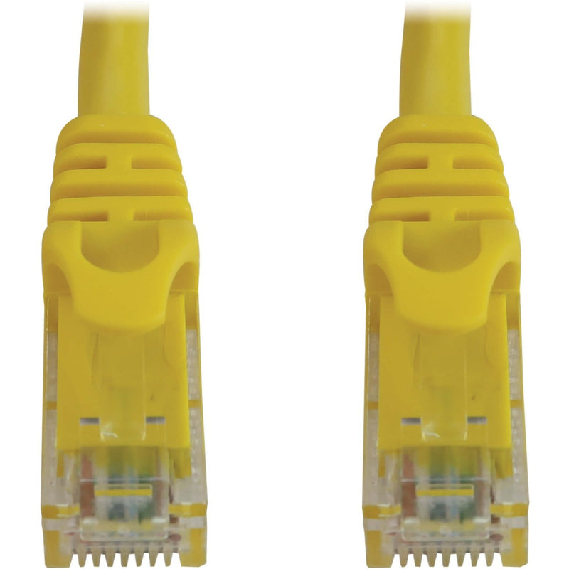 Close-up view of yellow snagless RJ45 connector showing protective boot design