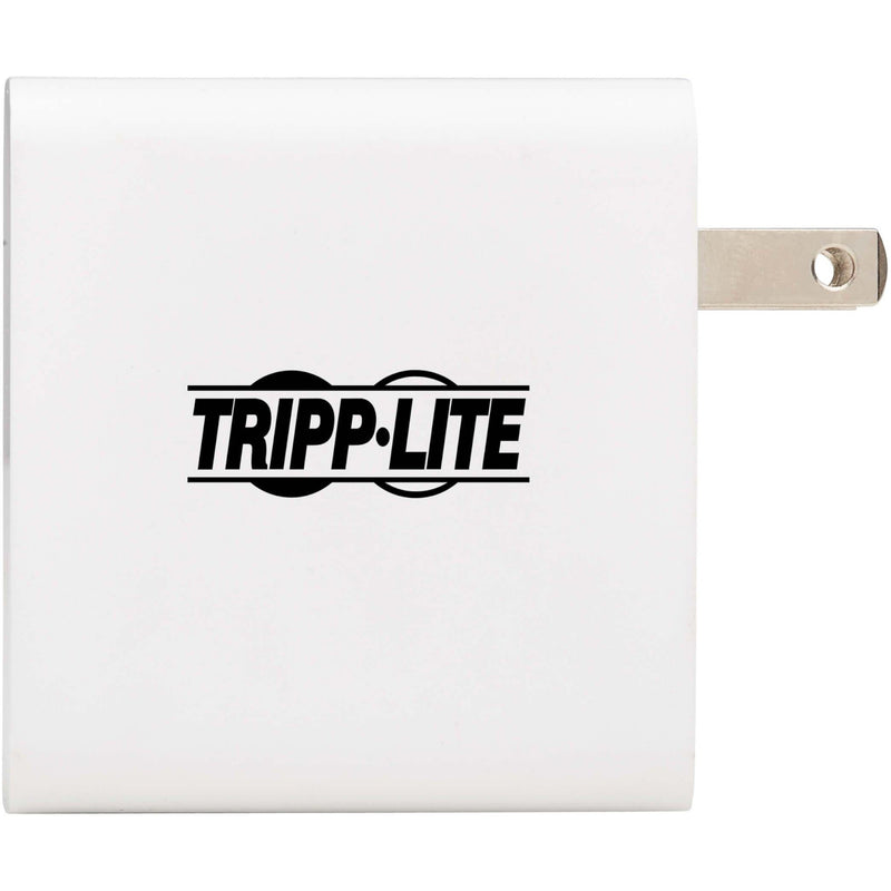 Side view of white Tripp Lite charger showing sleek design and folding plug