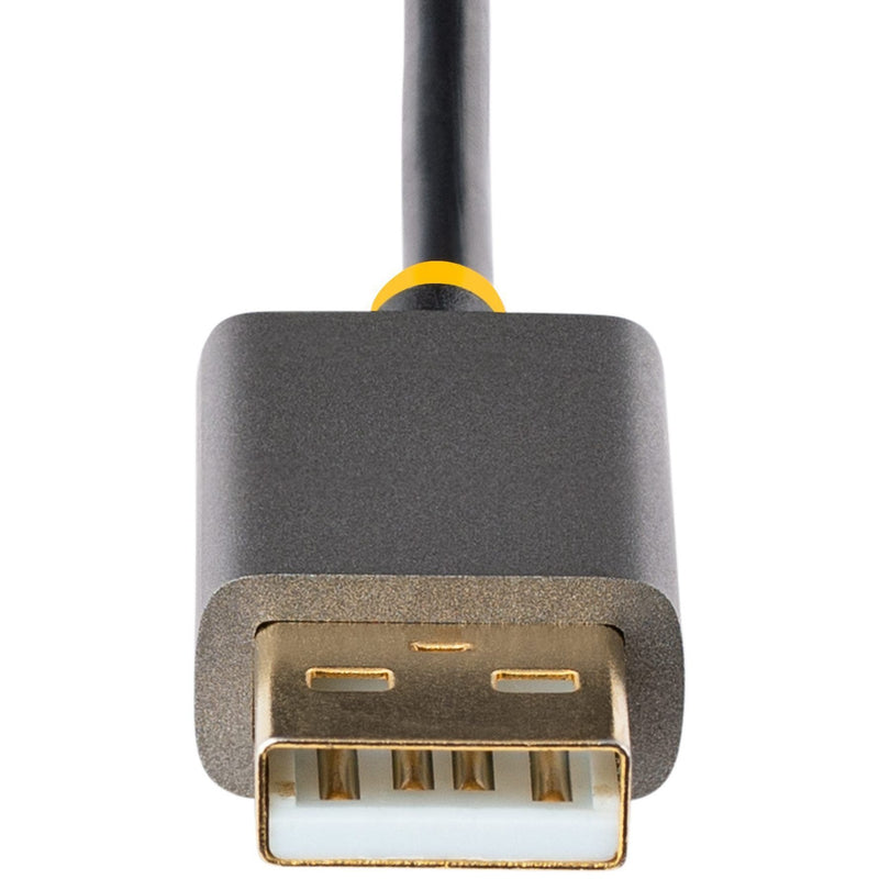 Close-up of USB power connector showing gold-plated contacts