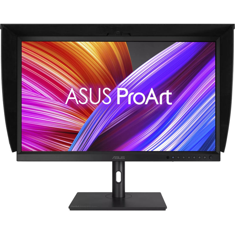 Front view of ASUS ProArt PA32DC with monitor hood attached showing display and control panel