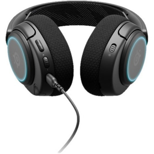 Close-up of Arctis Nova 3 ear cup controls with cyan RGB lighting-alternate-image4