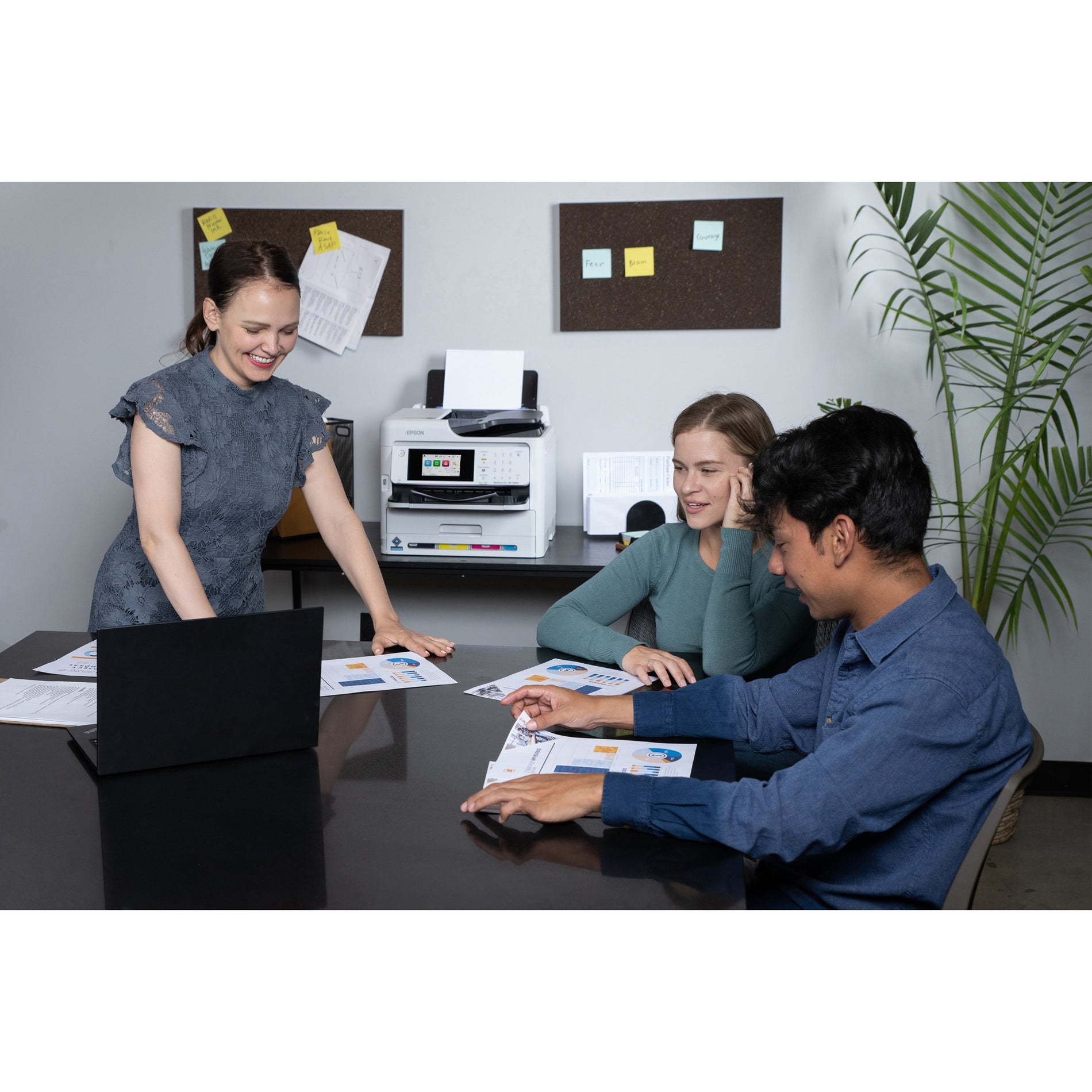 Team collaborating around Epson WF-C5890 printer in office meeting-alternate-image10