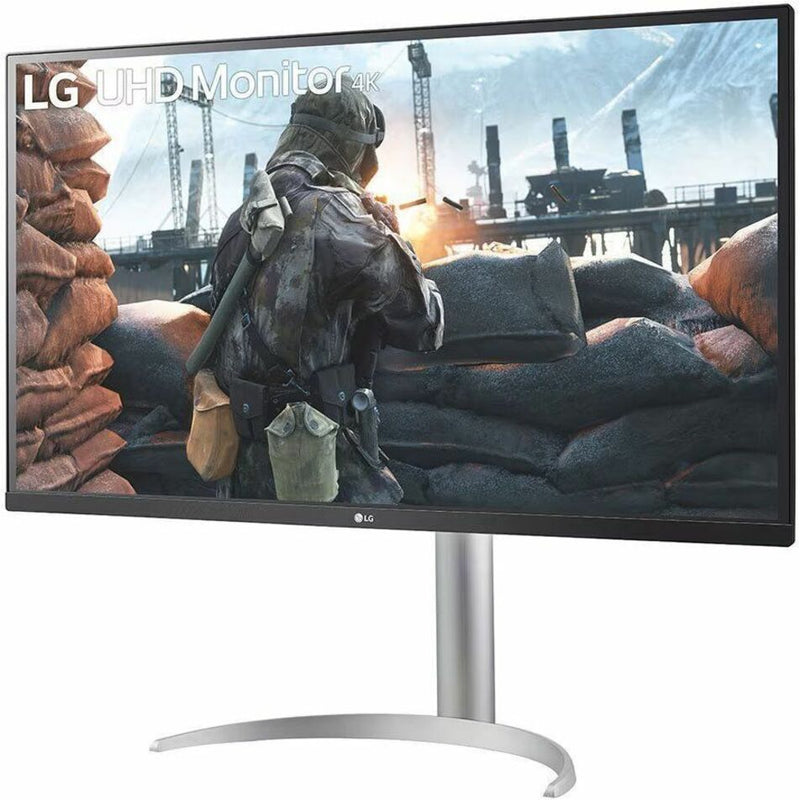 Front view of LG 27-inch 4K UHD monitor displaying gaming scene with silver stand