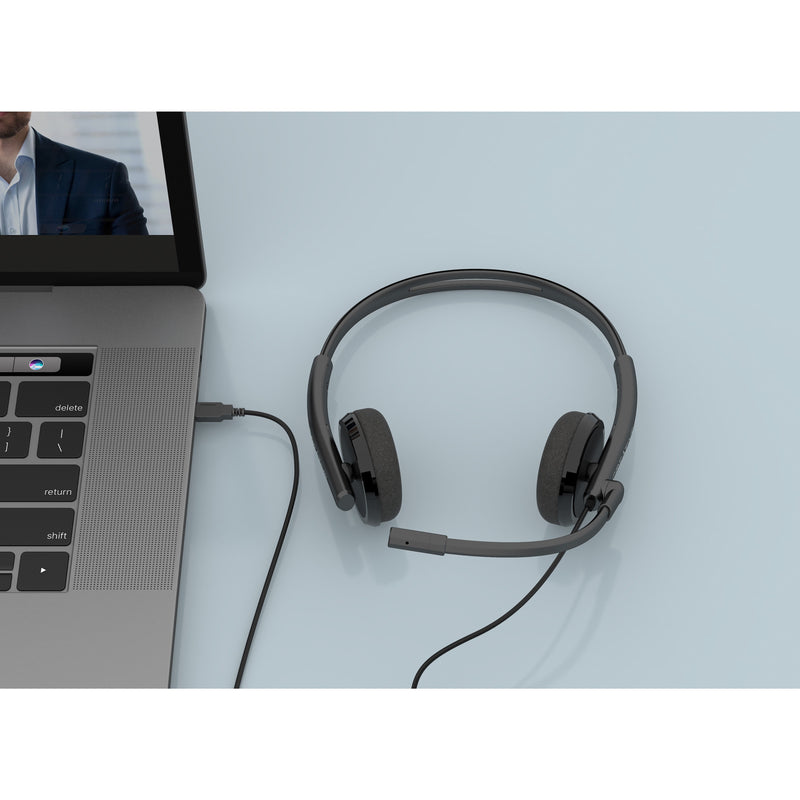 Creative HS-220 headset in professional workspace with laptop