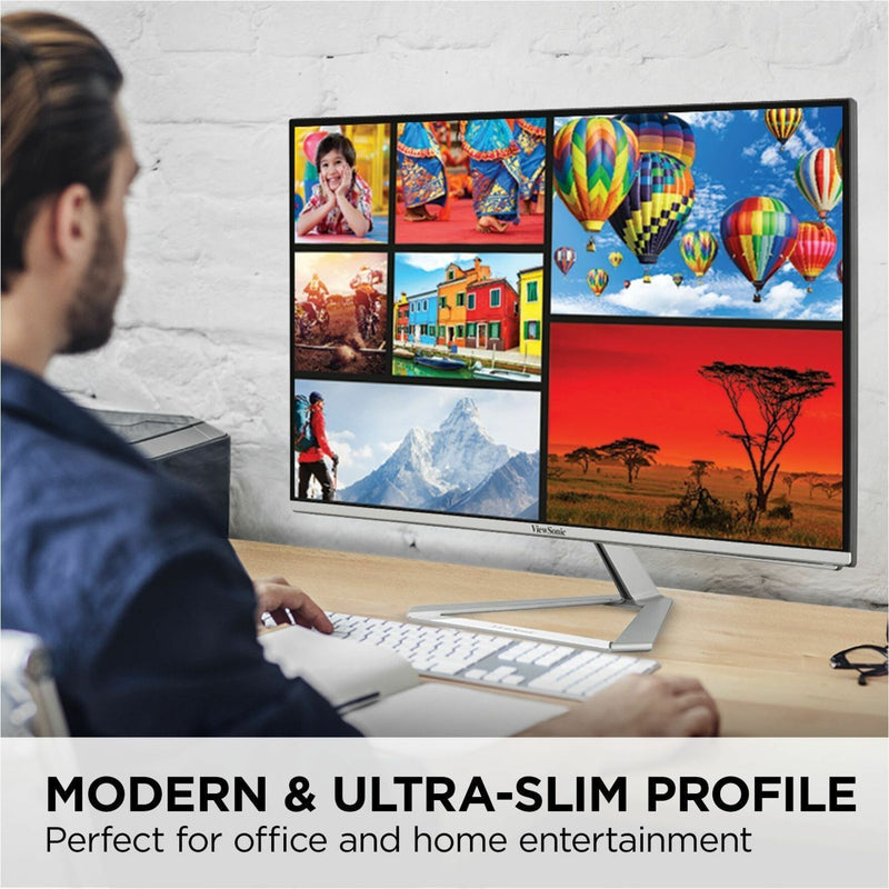 Person working at desk with ViewSonic monitor showing multiple applications