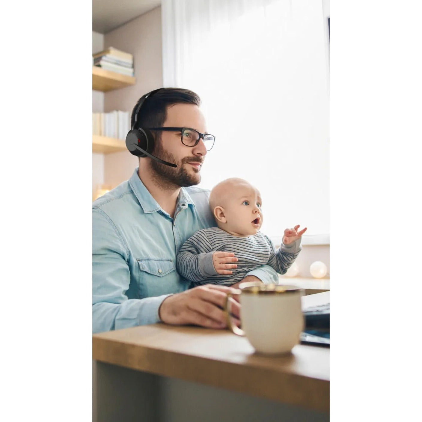 Professional working from home with child while wearing Jabra Evolve2 55-alternate-image9