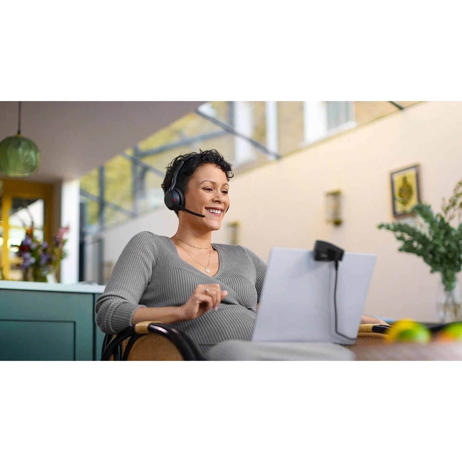 Person in home office using Jabra Evolve2 55 headset for video conference-alternate-image11