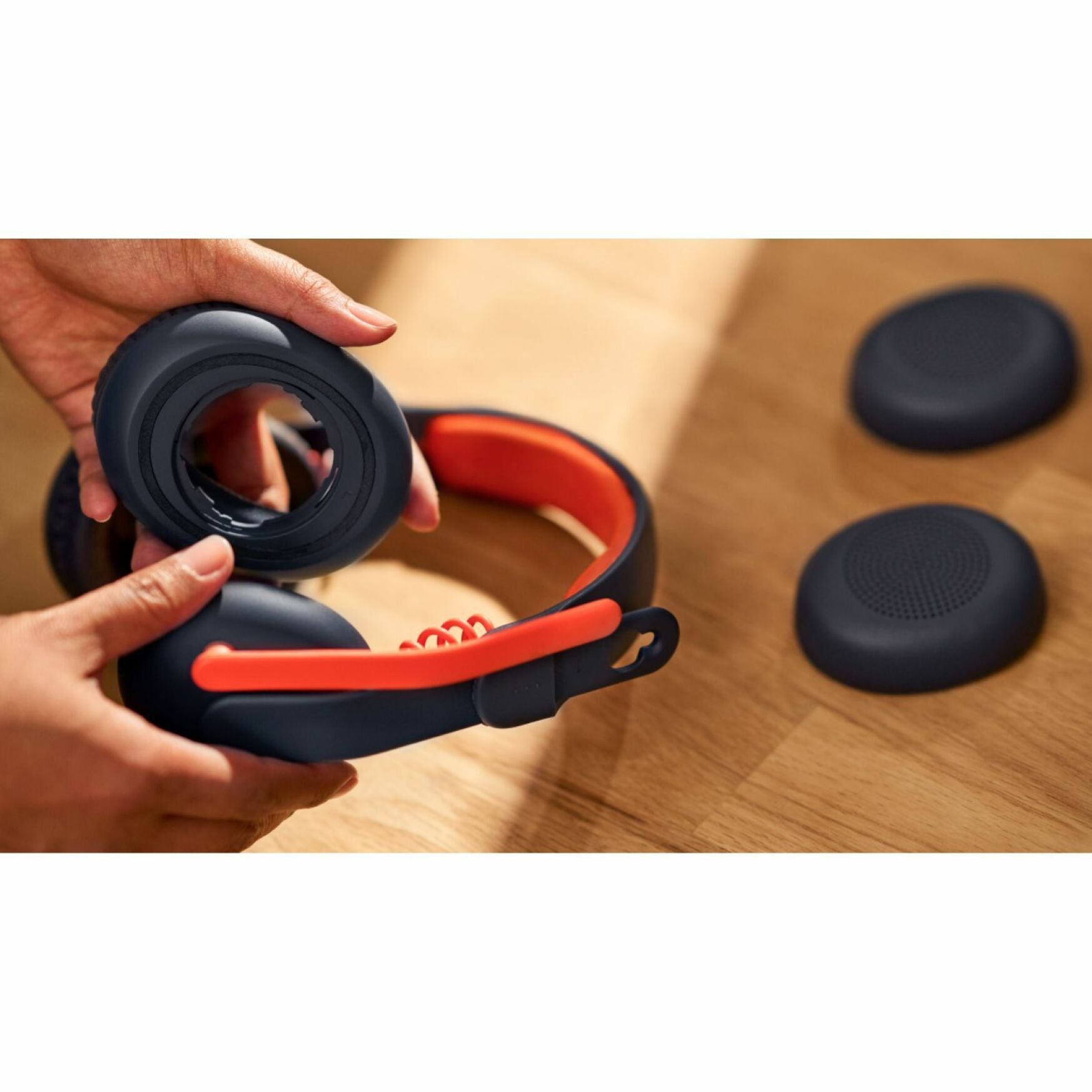 Demonstration of swappable ear pads on Logitech Zone Learn headset-alternate-image5