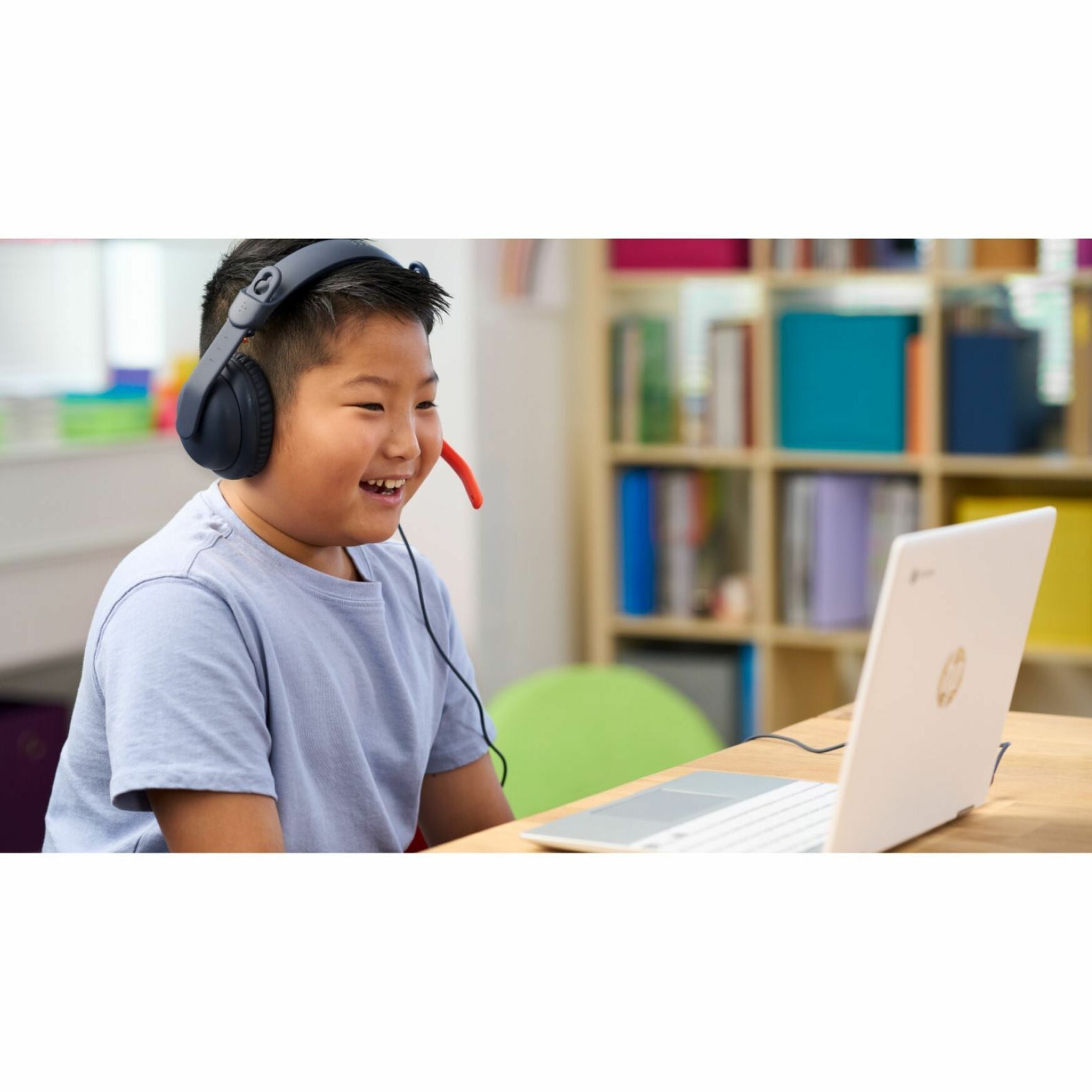 Student using Logitech Zone Learn headset while engaged in online learning-alternate-image4